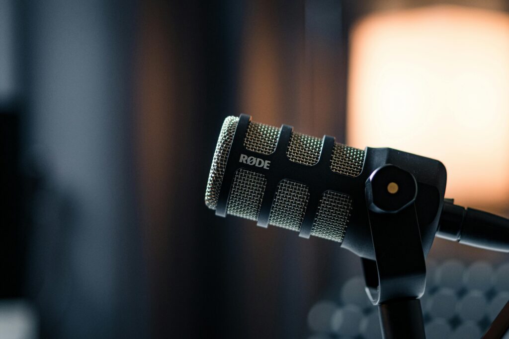 Podcast microphone close-up for recording interviews, representing podcast guesting and podcast booking agency services